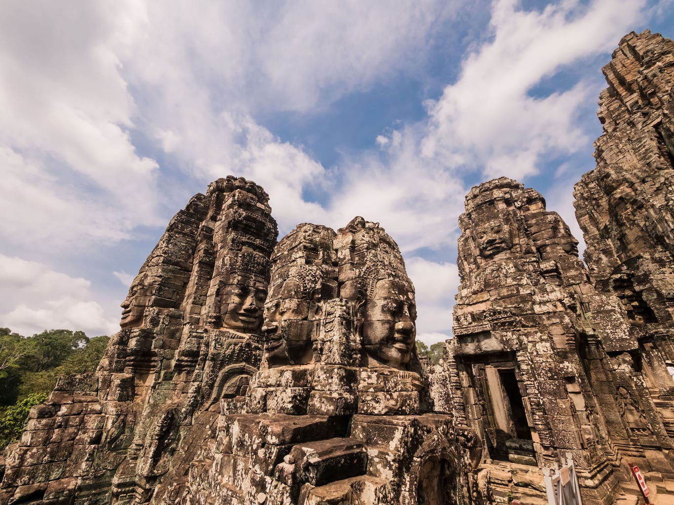 Smiling faces at the Bayon in Angkor Wat