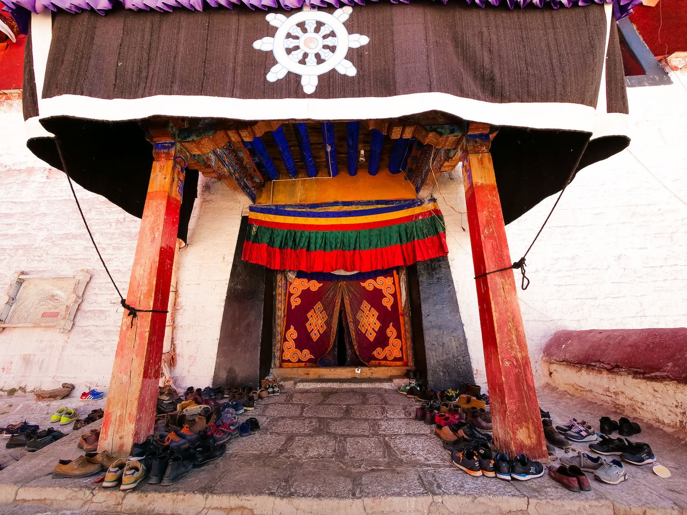 Shoes outside Ganden monastery hall