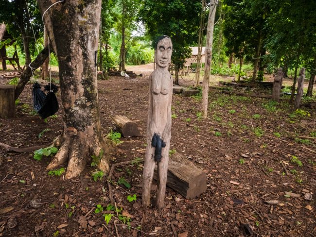 Statue by the huts