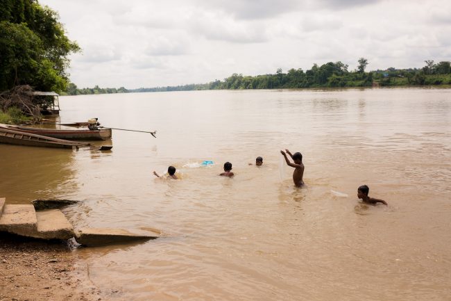 Children playing in the river