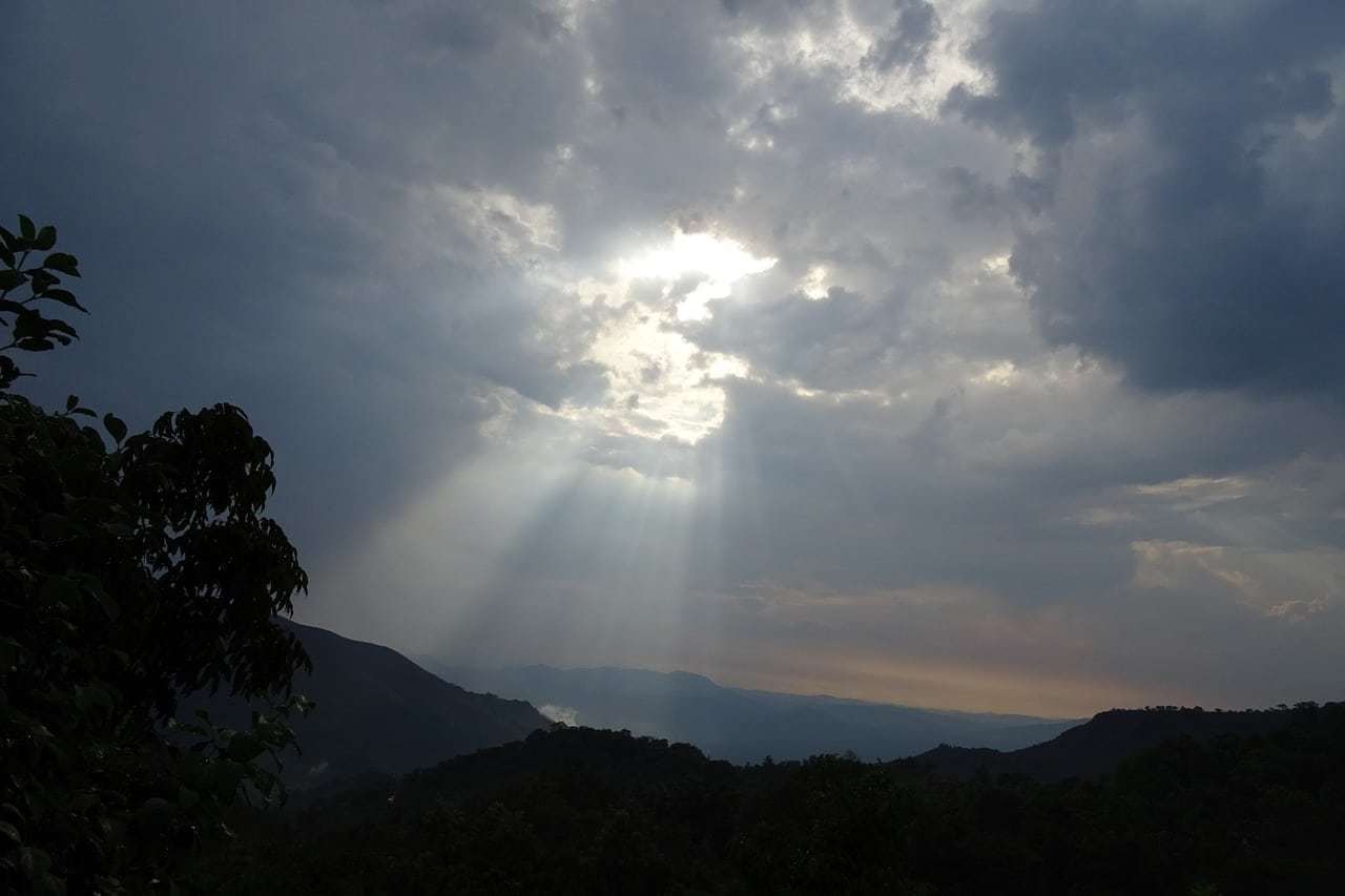 Sun escaping through the clouds in Agumbe