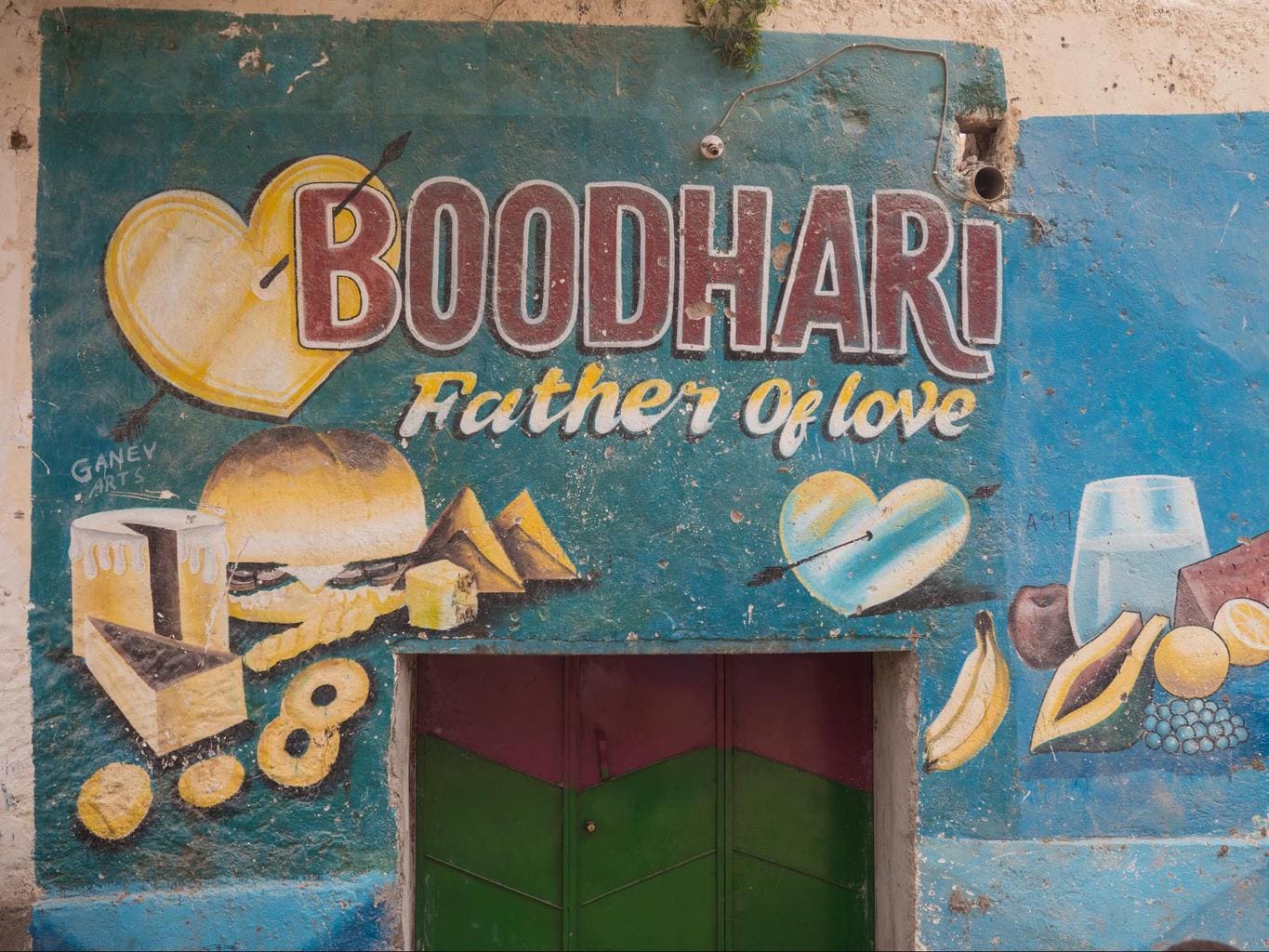 Local murals in Berbera with the range of goods for sale at the store