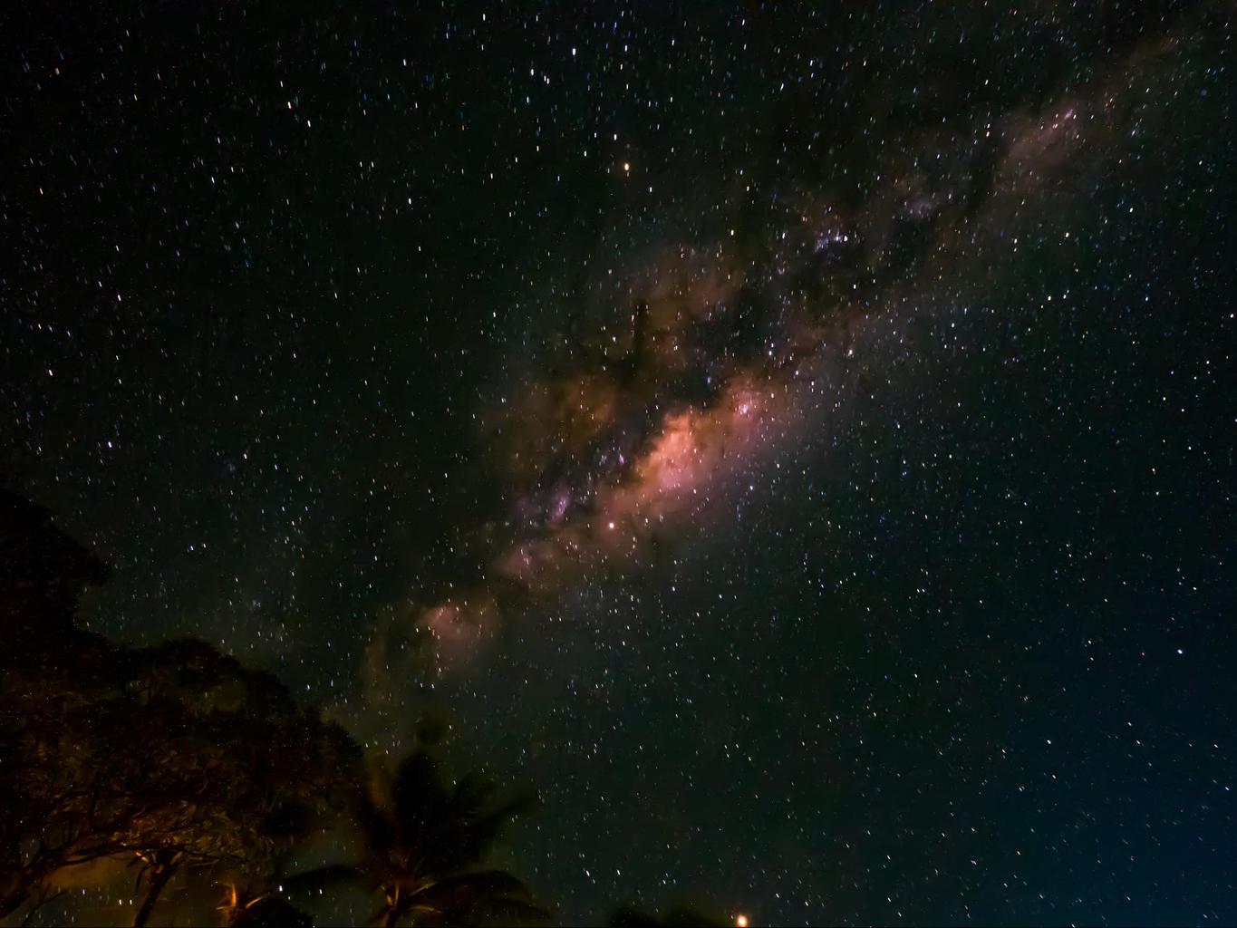 Starry Milky Way above, the beauty of remote island paradises