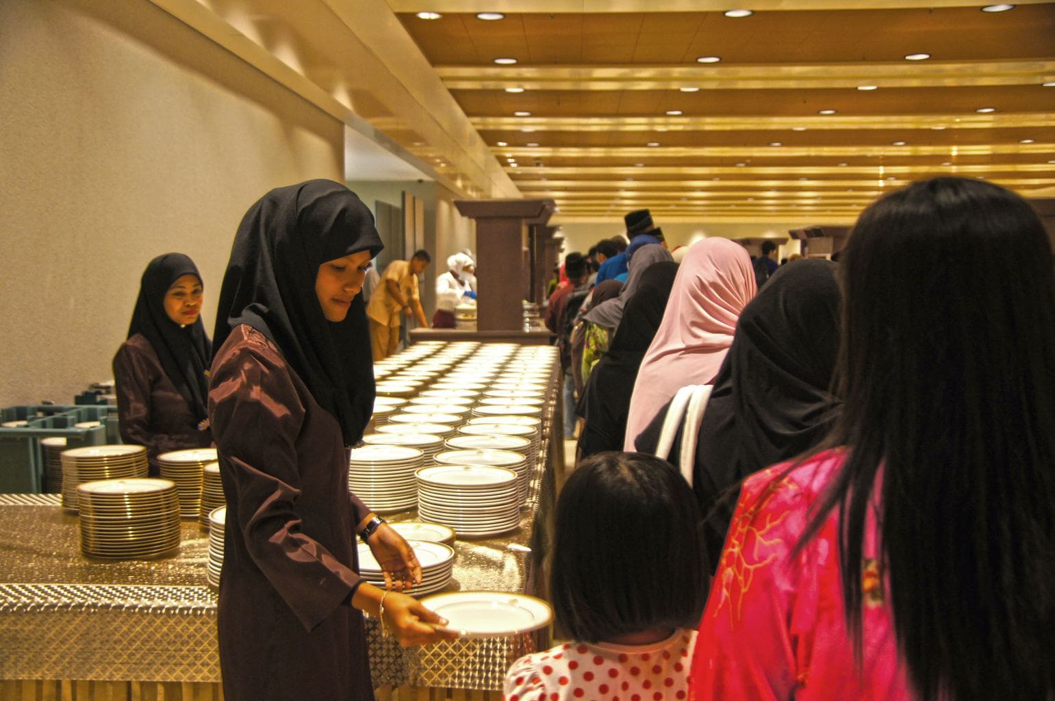 Handing out plate before the feast