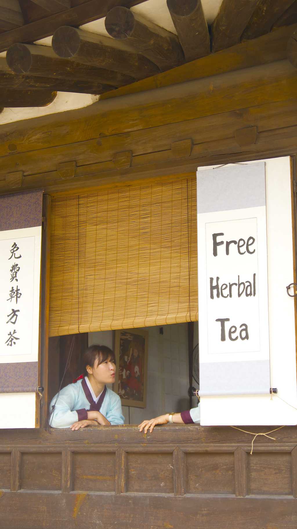 Wearing Hanbok and drinking tea in a Hanok