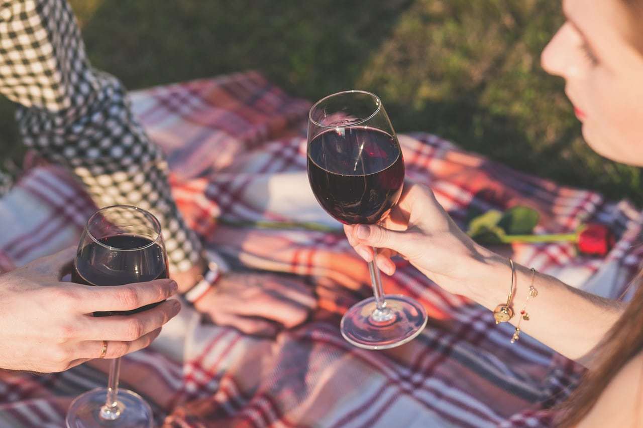 Everyone enjoys a glass of wine with friends