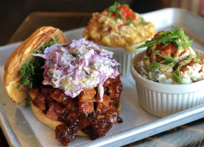 Orange bird BBQ with mac 'n cheese and potato salad close up