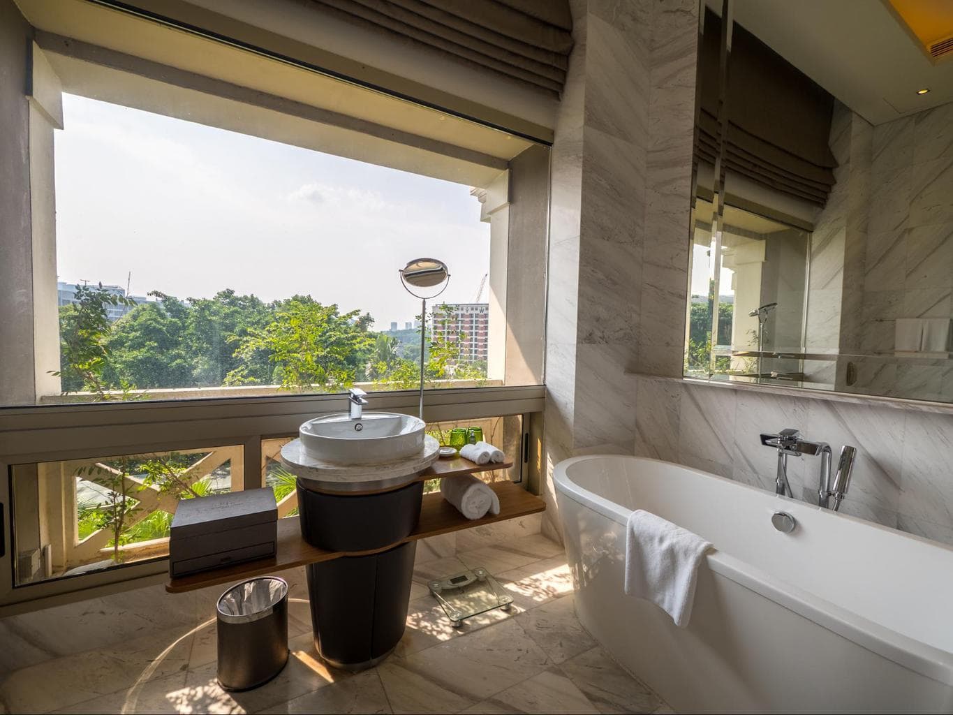 The sun-kissed verandah bathrooms at Hotel Fort Canning