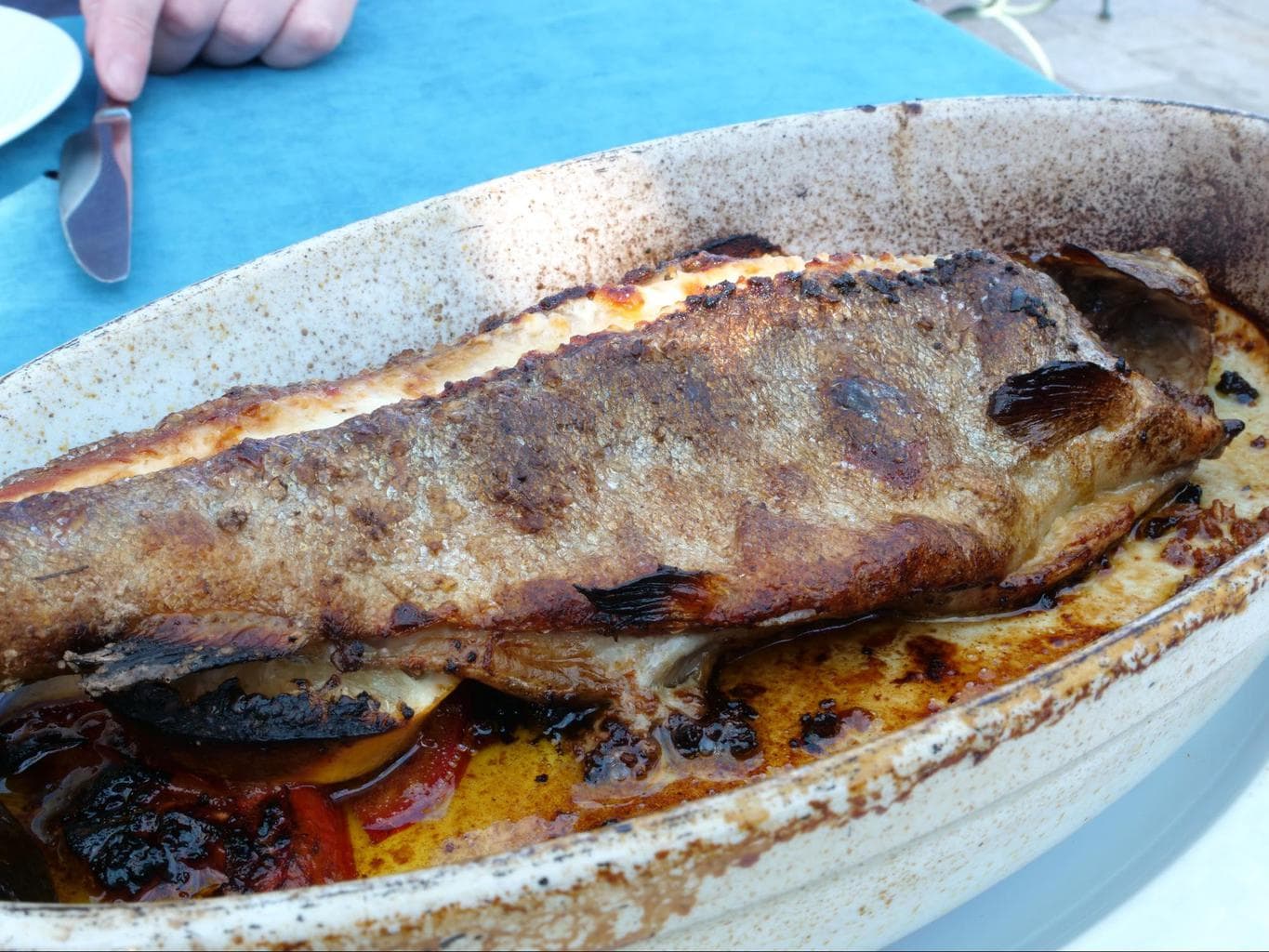 Baked whole sea bream fish