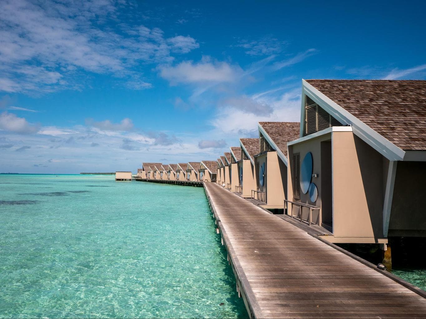 The back of the romantic pool water villas at LUX*