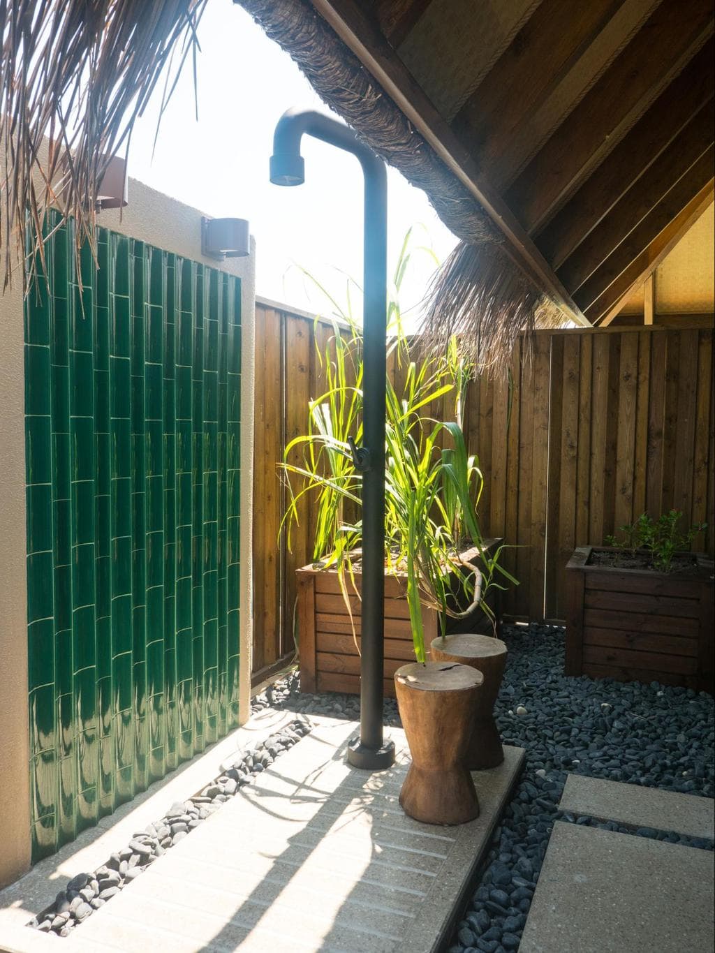 Outdoor bathrooms in Joali’s water villas