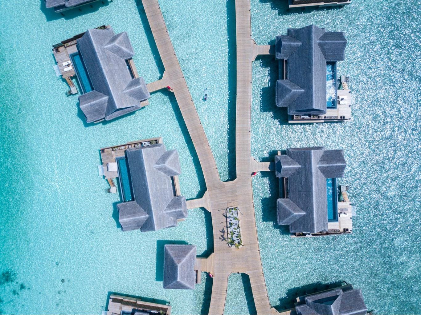 The luxury water villas at Joali Maldives drone shot