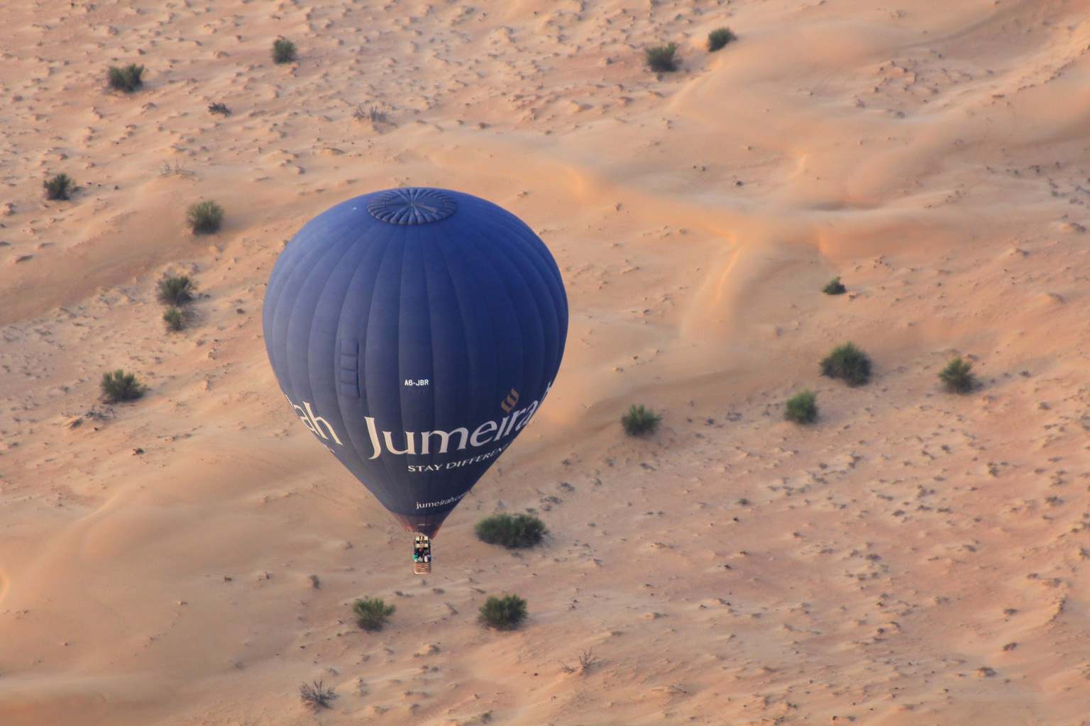 Sunrise hot air balloon over the desert
