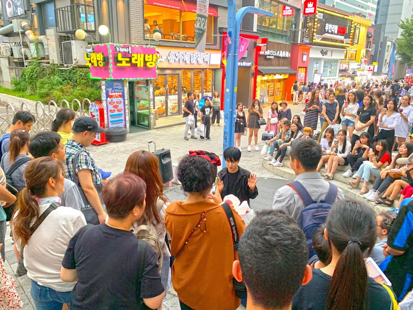 Watching a performance in Hongdae