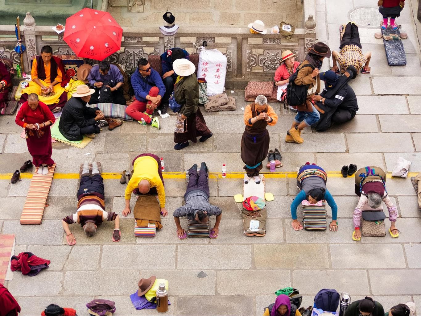 Locals prostrating in front of Jokhang Temple