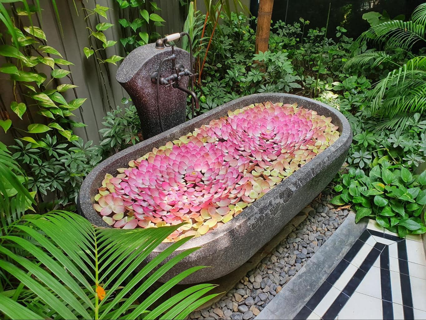A surprise lotus flower bath prepared by our Bensley Butler