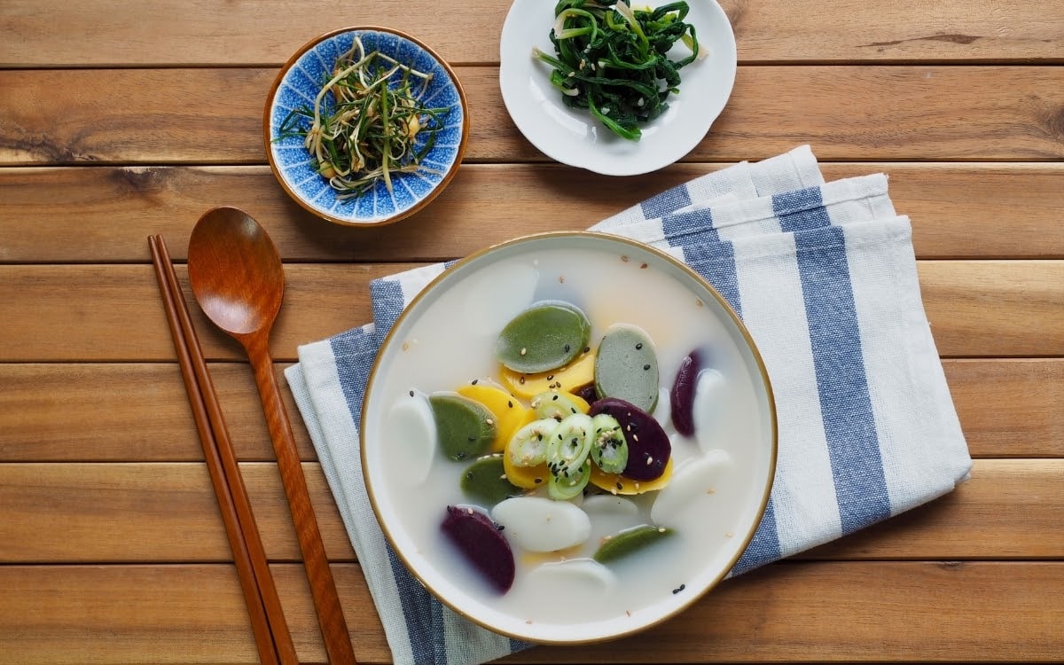 Tteokguk (rice cake soup) is traditionally eaten on Lunar New Year 