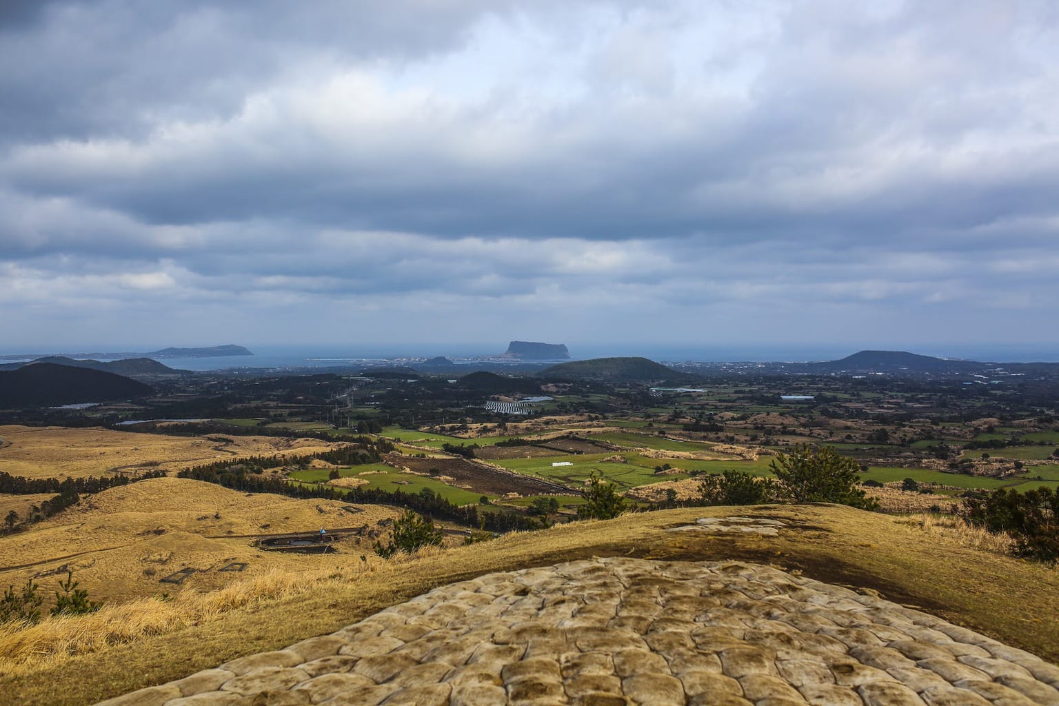 Hiking one of the volcanic cones in Jeju